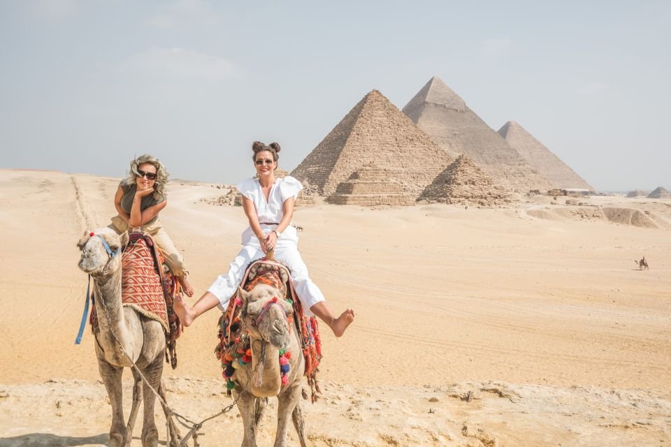 Tourists visiting the Great Pyramids of Giza during a 4-day budget Egypt tour