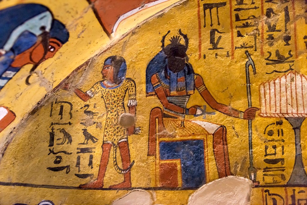 Egypt Budget tour group at White Desert limestone rocks and Cairo Pyramids.