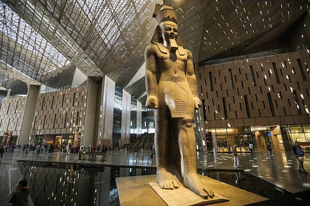 Grand Egyptian Museum near Giza displaying ancient Egyptian statues and artifacts