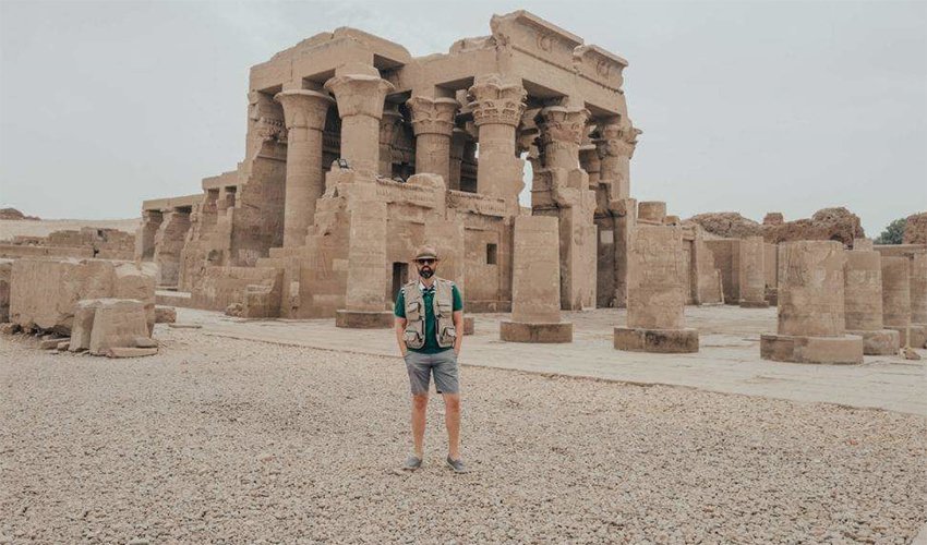 The Temples of Kom Ombo in Upper Egypt, featuring symmetrical twin sanctuaries with detailed ancient carvings overlooking the Nile River.