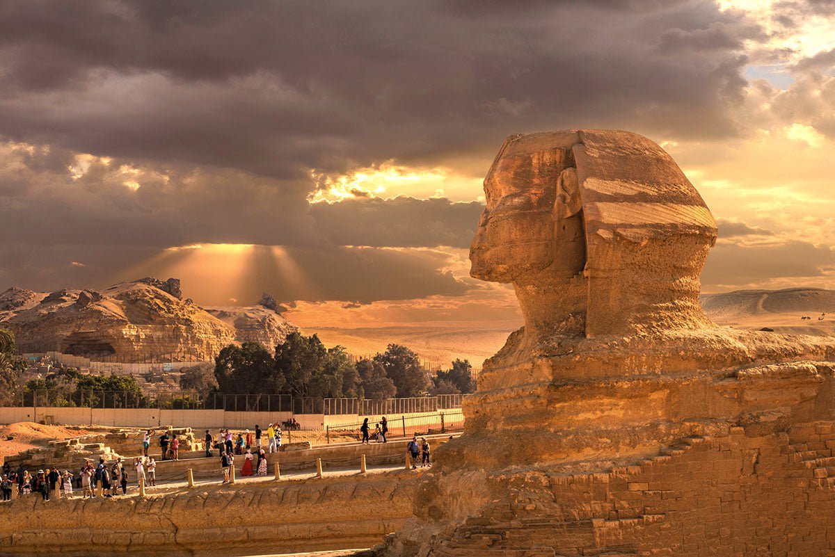 Egypt Day Tours: Tourists visiting the Giza Pyramids, Cairo Citadel and Coptic Cairo during a one day Cairo sightseeing tour